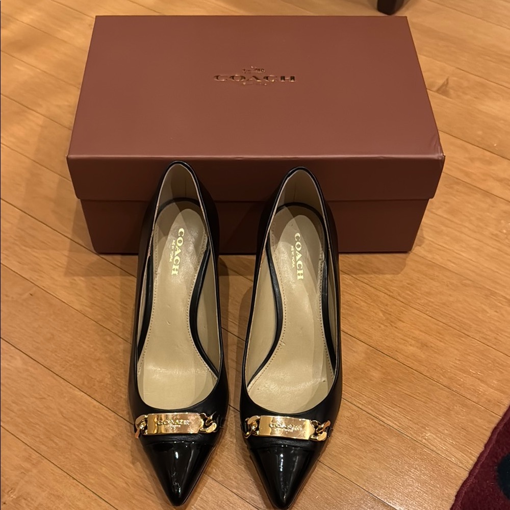 Coach Black Pumps with Gold Accents
